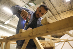 George assembles the Sauna tent framework